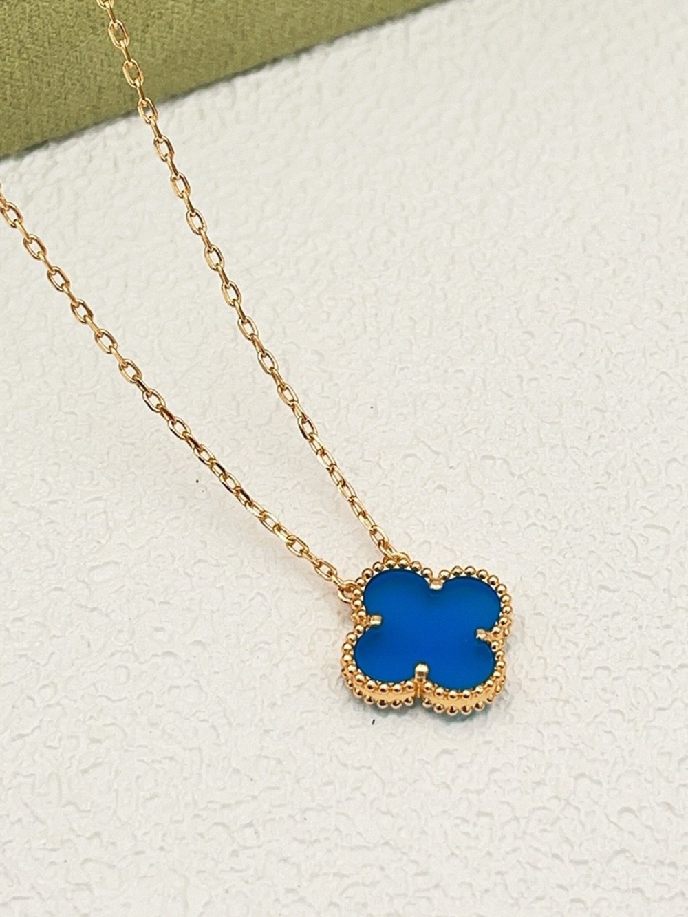 Van Cleef & Arpels Gold Necklace with Blue Clover Motif
